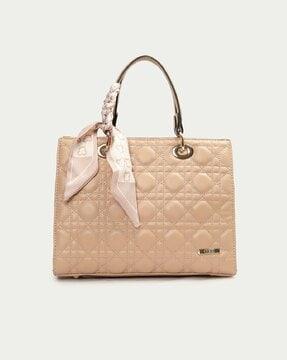 women quilted handbag with metal accent
