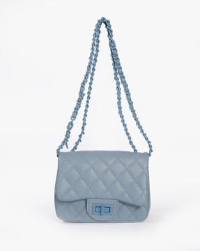 women quilted sling bag with flap closure