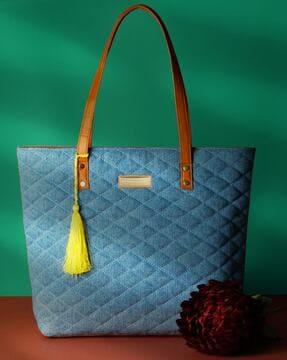women quilted tote bag with tassel