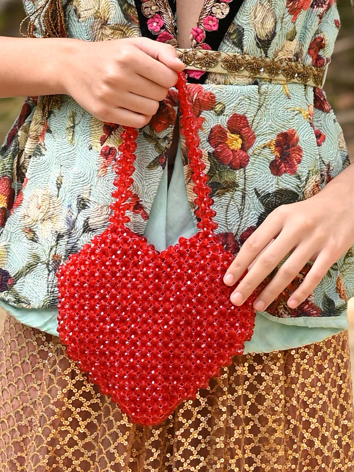 women red beads embellished clutch