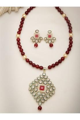 women red kundan-studded & beaded handcrafted jewellery set