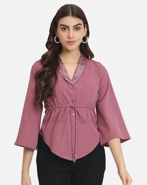 women regular fit embellished top with button closure