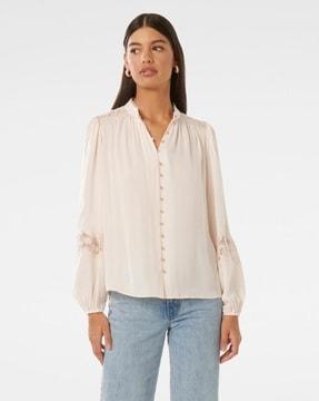 women regular fit top with button closure