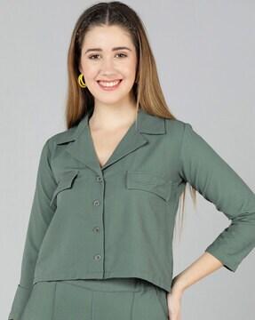 women regular fit top with flap pockets