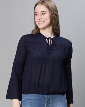 women regular fit top with tie-up neck