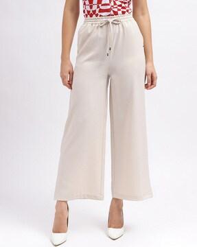 women relaxed fit flat-front pants