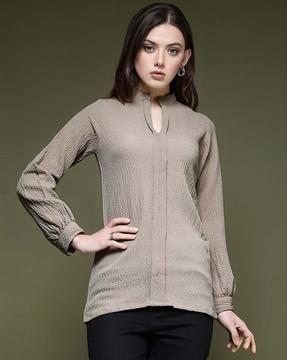 women relaxed fit top with cuffed sleeves