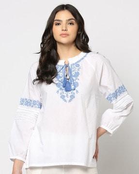 women relaxed fit top with embroidered yoke