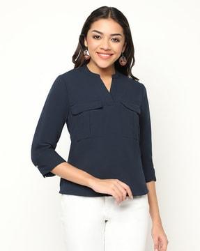 women relaxed fit top with flap-pockets