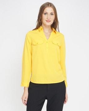 women relaxed fit top with flap pockets