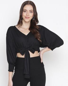 women relaxed fit top with knot accent