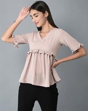 women relaxed fit top with ruffled detail