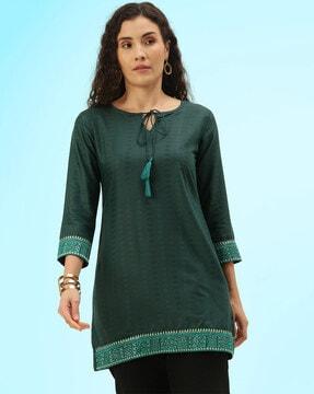 women relaxed fit top with tie-up neck