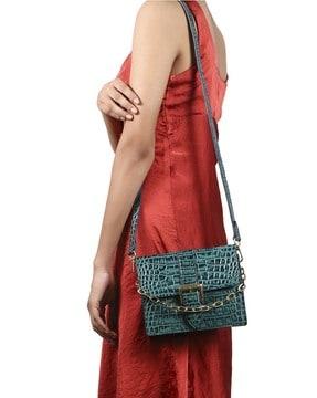 women reptilian pattern sling bag with detachable strap