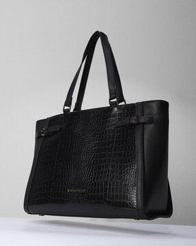 women reptilian pattern tote bag