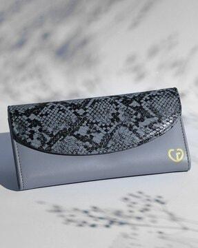 women reptilian pattern tri-fold wallet