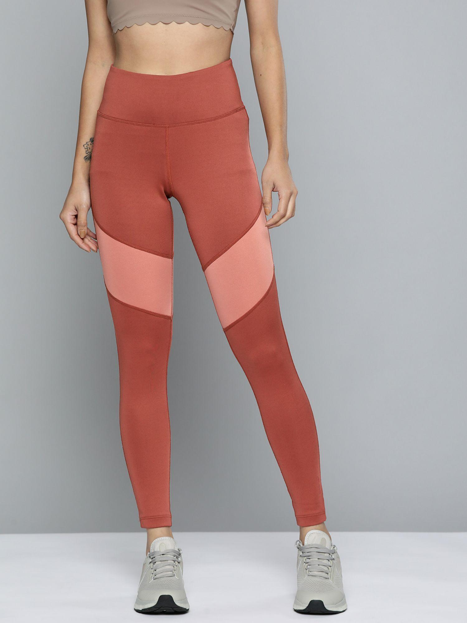 women rust-orange colourblocked cropped sport tights