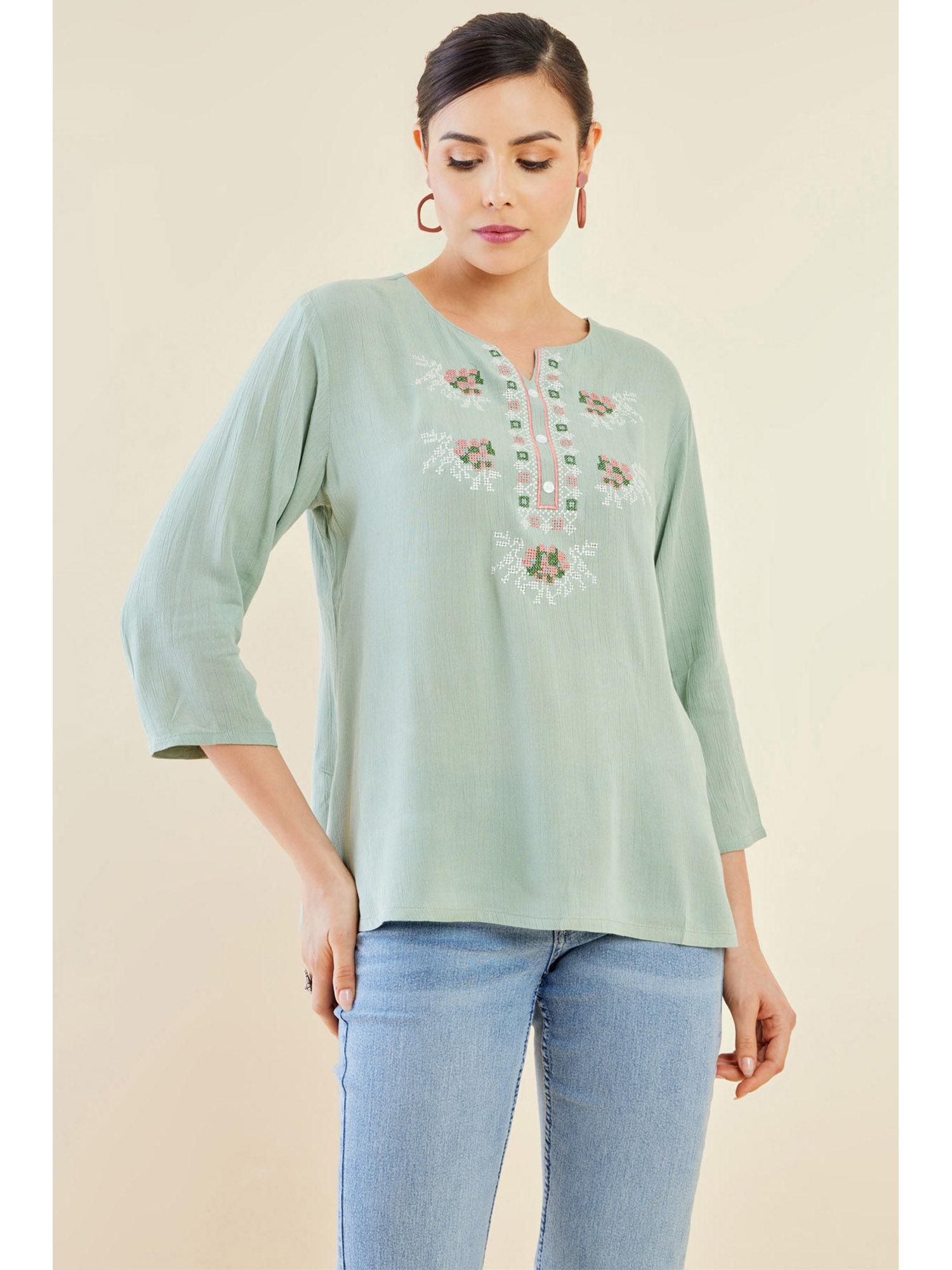 women sap green crepe tunic with geometric embroidery