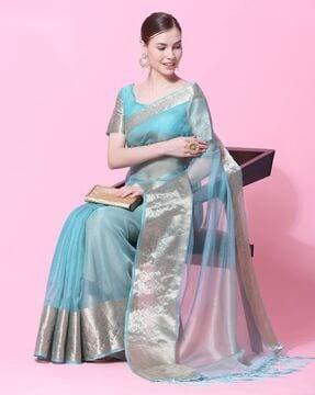 women saree with contrast border and tassels