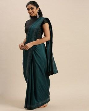 women saree with embellished border