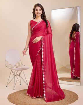 women saree with embellished border