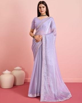 women saree with embroidered border