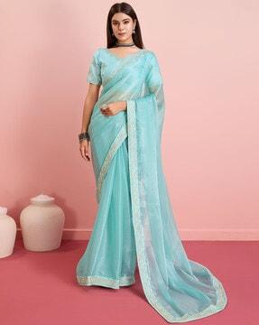 women saree with embroidered border
