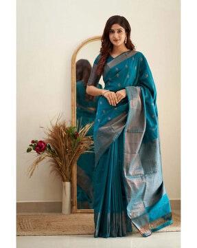 women saree with floral woven motifs