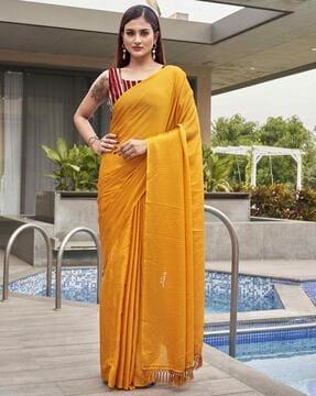 women saree with tassels