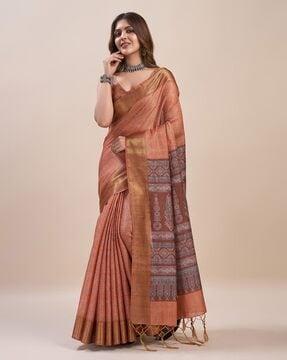 women saree with tassels