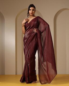 women saree with tassels