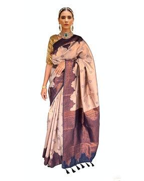 women saree with woven motifs & tassels