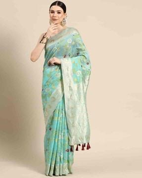 women saree with woven motifs & tassels