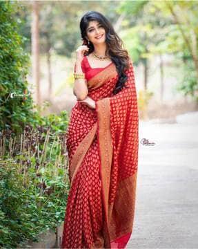 women saree with woven motifs