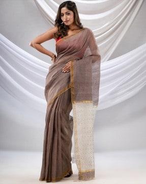 women saree with woven motifs