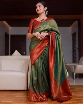 women saree with woven motifs