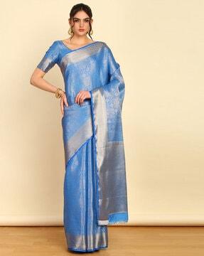 women saree with woven motifs