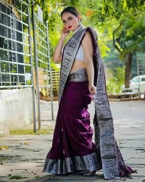 women saree with woven motifs