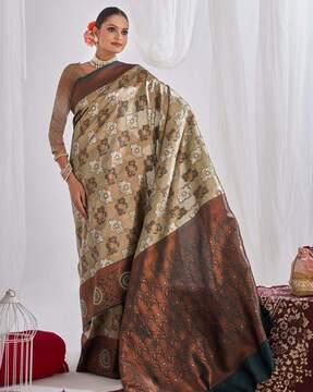 women saree with woven motifs