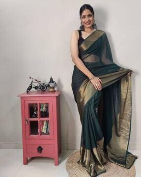 women saree with zari patta