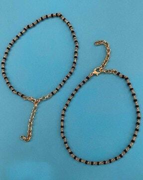 women set of 2 gold-plated anklets