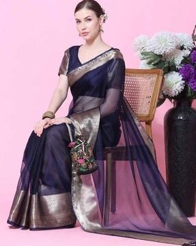 women sheer-through organza saree with zari border