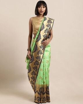 women silk saree with floral woven motifs