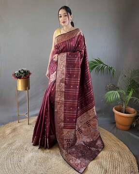 women silk saree with woven motifs
