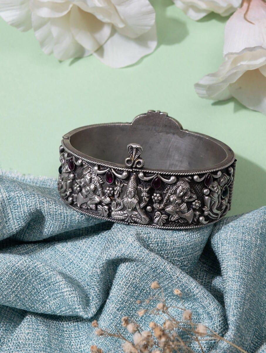 women silver hinged back silver bangles