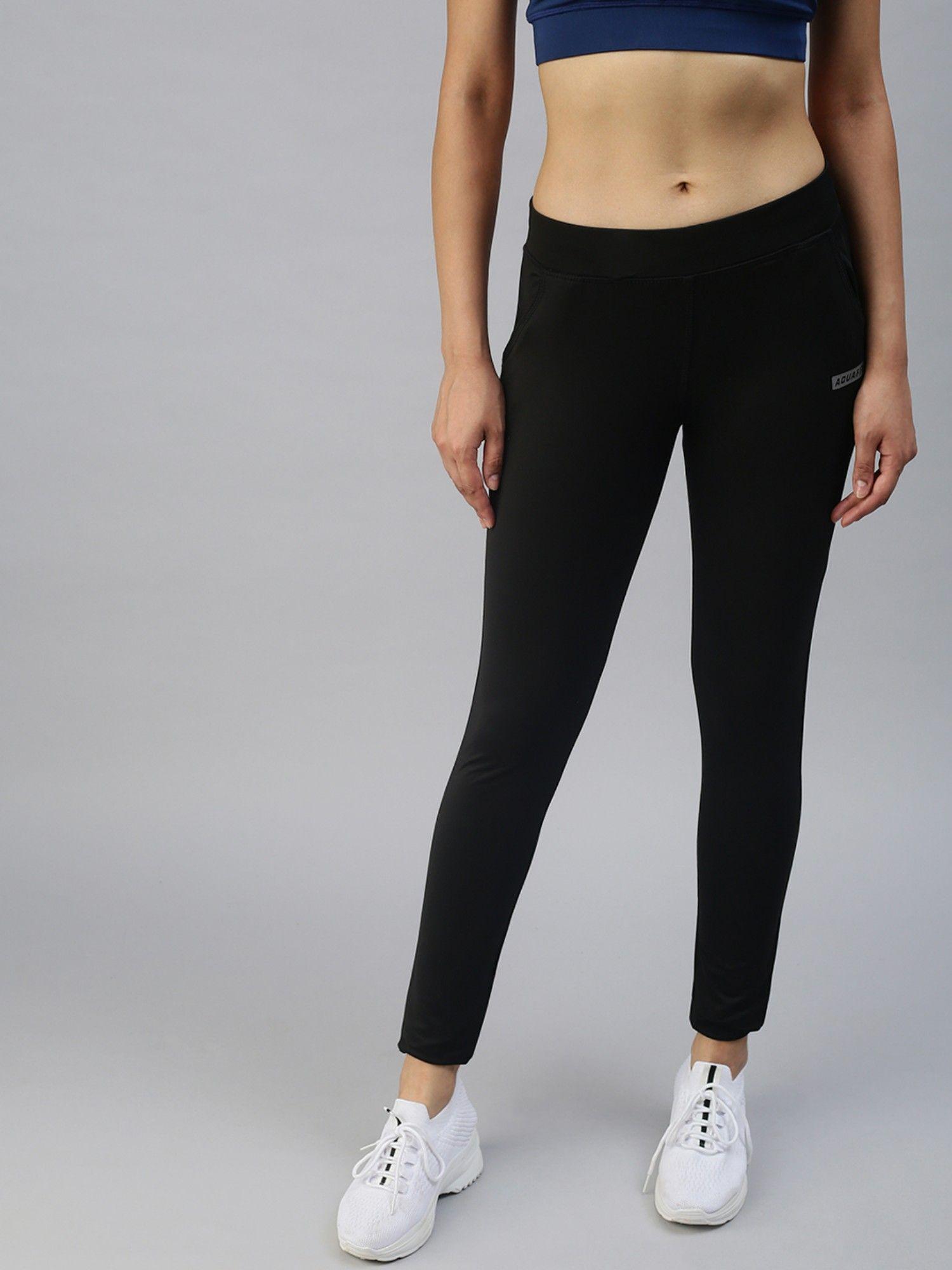 women slim fit black solid track pants