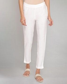 women slim fit flat-front pants