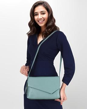 women sling bag with adjustable strap