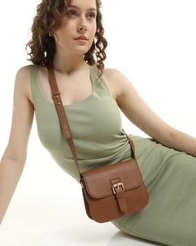 women sling bag with adjustable strap