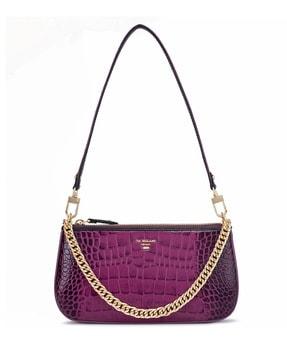 women sling bag with chain accent